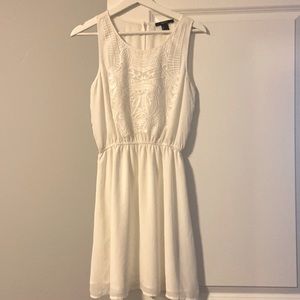 White dress with stitching detail. Size small